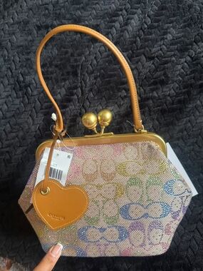 Coach Rainbow Signature Canvas Kiss-Lock Top Handle Bag - Orange Accent